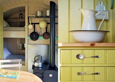 Composite picture of Boundary kitchen area with woodburning stove, kettle and pans, and the wash stand with yellow painted wood panelled walls and drawers with cutlery as handles