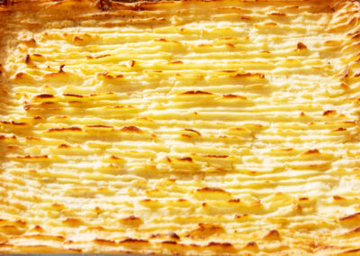 Crispy potato topping of a Cottage Pie to order one of our booking extras at Wallops Wood